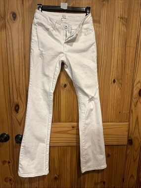White Flare Jeans with Subtle Distress - Women's